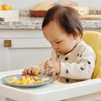 Toddlers need to be able to hold their heads up unaided, with good coordination, before they should be weaned