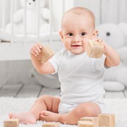 Playing with blocks or lego helps infants develop bilateral coordination skills.