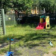 We have an extensive grassy area where children can enjoy nature.