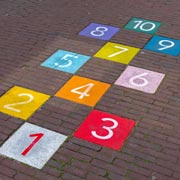 Toddlers can practise jumping on hopscotch numbers and parents can encourage them to say the numbers out loud.