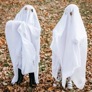 A white bedsheet with two eye-holes suitably positioned makes for a wonderfully-effective ghost costume.